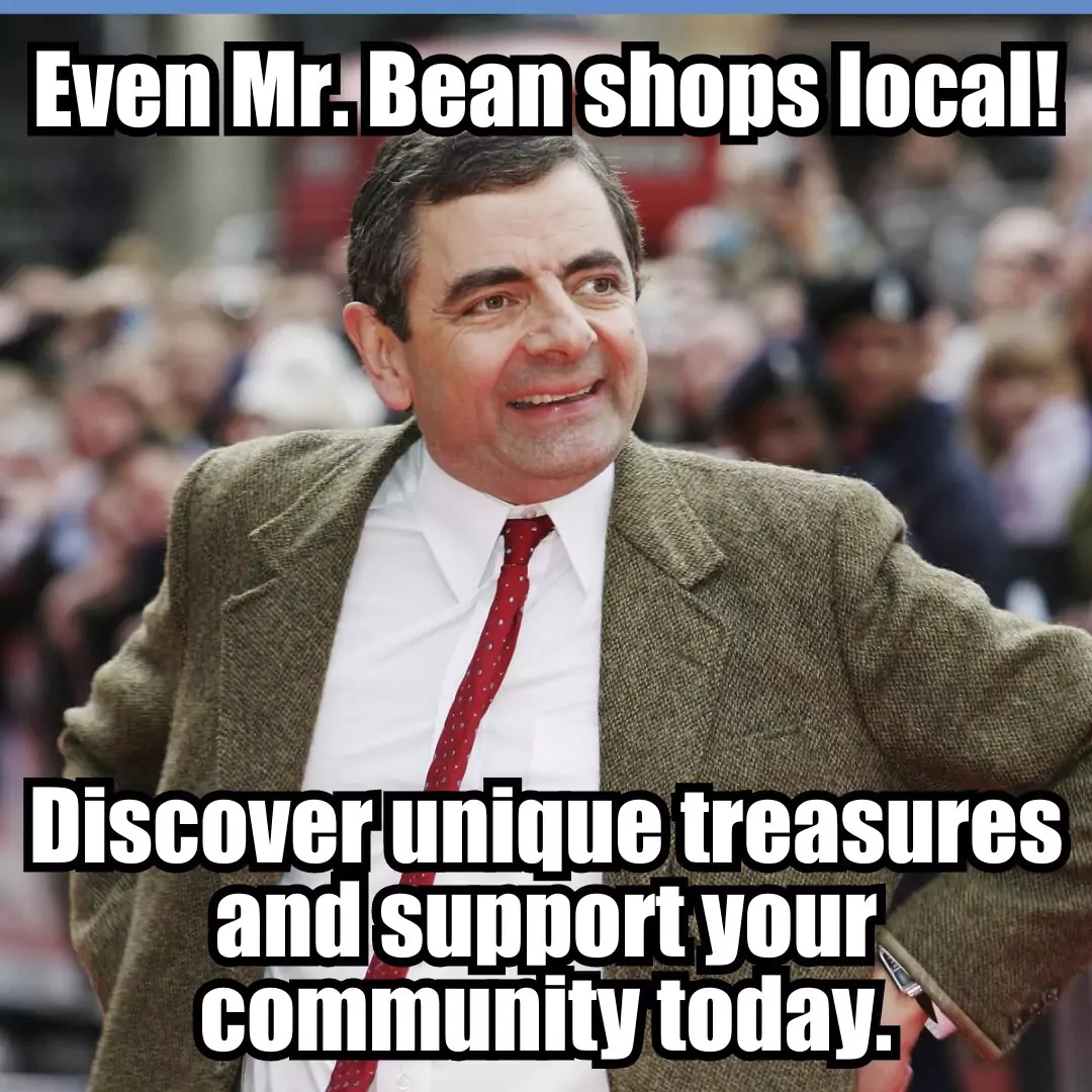 A person in a suit with text promoting local shopping, "Even Mr. Bean shops local!"